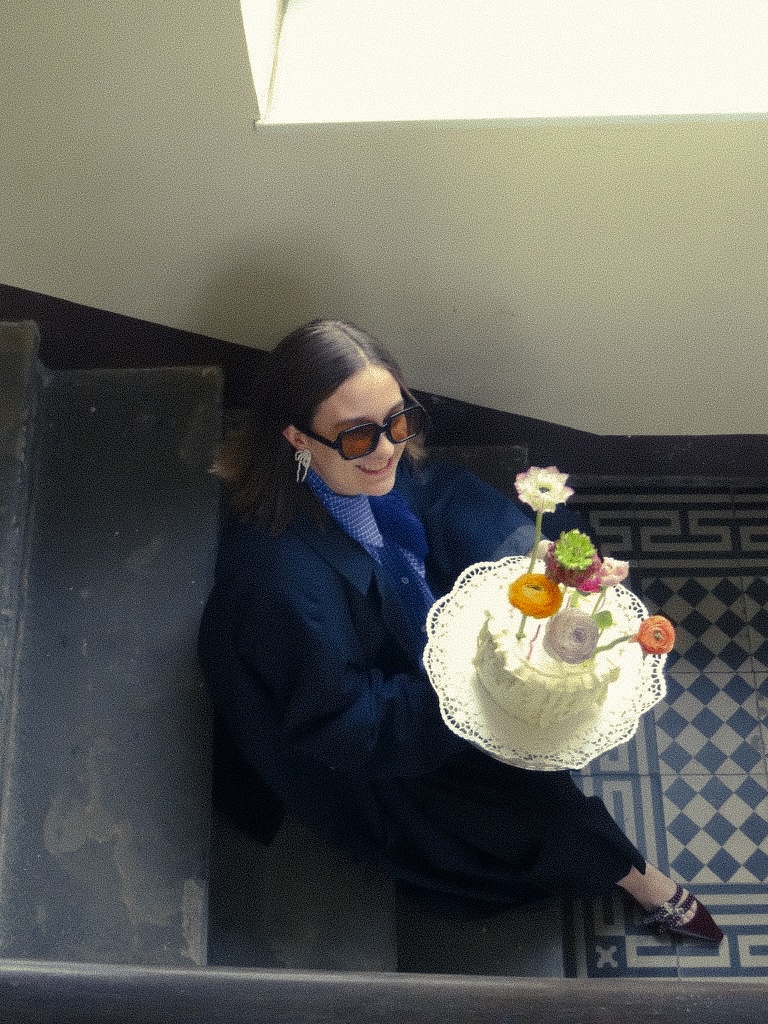 a picture of a girl with a cake